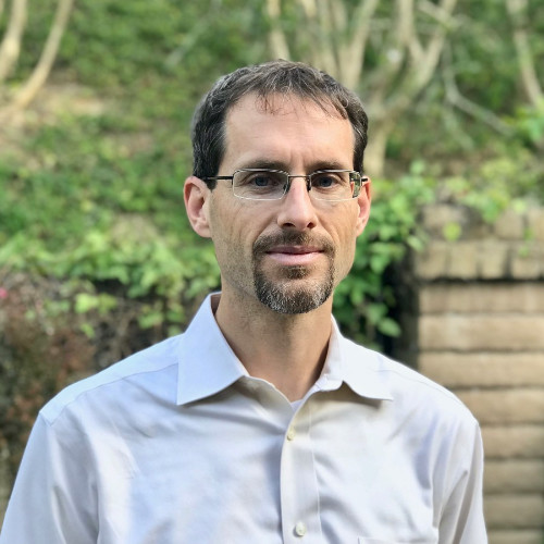 Dr. Brett Maune